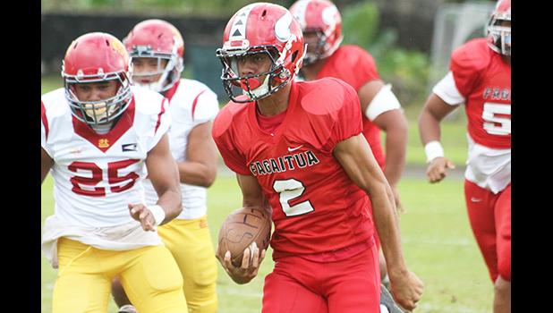 Faga’itua Vikings quarterback Fitu Amata Jr. breaking