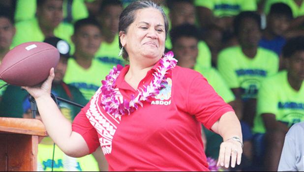 Director of DOE, Dr. Ruth Matagi Tofiga getting ready to send off the opening pass