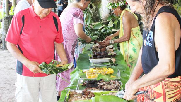 Candyman and Tisa dishing up the feast at the annual tattoo festival