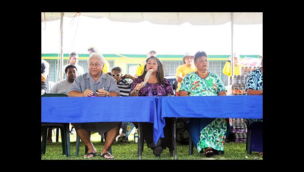 FFAS President Faiivae Iuli Alex Godinet, left, with Vice-President and FIFA Council member Sandra Fruean, middle, and FFAS executive member Saili Ott during the closing ceremony of the 2016 FFAS Private Elementary Schools Soccer League at Kanana Fou on Tuesday, Nov. 22, 2016.  [FFAS MEDIA/Brian Vitolio]