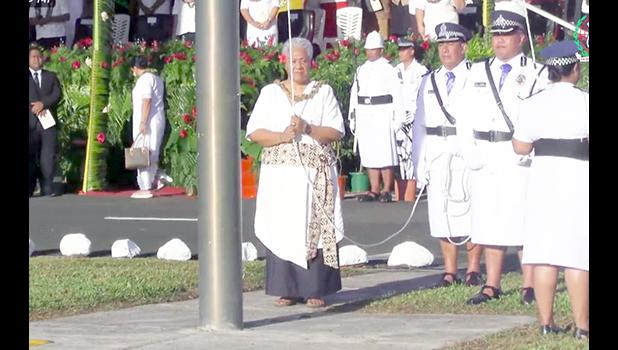 Fiame raising samoa flag