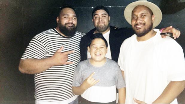 Cornelius Helg of Samoana High School, who was in Apia this past weekend for a family gathering, met up with one of his favorite bands, formerly known as the Wellington based reggae band Brownhill that performed and played with legendary artist George “FIJI” Veikoso’s  in a concert hosted by Bluesky 4g Plus in Apia, Samoa last Friday night. [photo: Ese Malala]