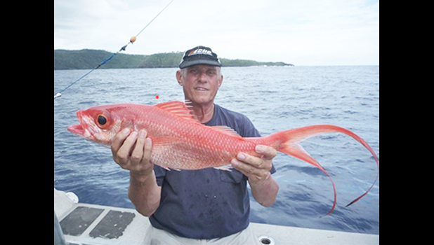Man with bottom fish