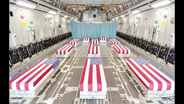 Flag-draped caskets