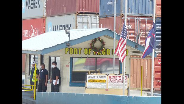 Flags lowered at entrance to port