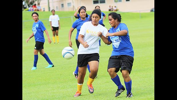 Jordynn Liu-Kuey of Fa’asao-Marist (left) in action against a Samoana defender during