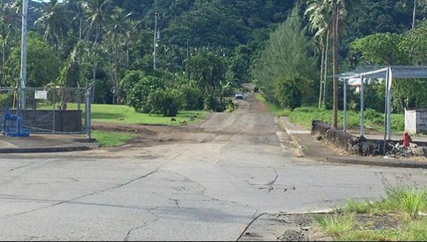 the four-corner intersection: the road from Fagaima heading into Kokoland area, as well as into Ottoville; and the unpaved road (up ahead), passing through the Fonoti family property, and further up to the Leapaga family land on to the main road in Malaeimi. 