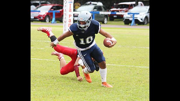 Samoana Sharks Toeaso Sola shakes off a defender