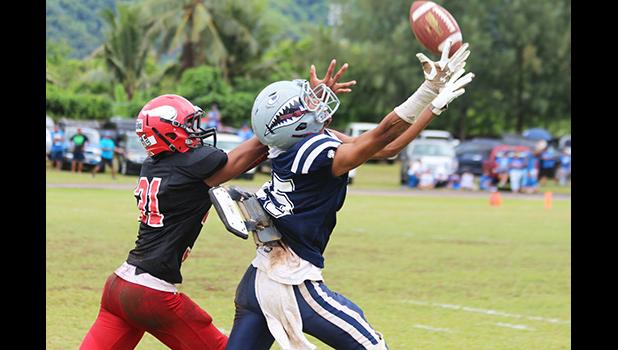 Allen Seagai focuses on hauling in this catch