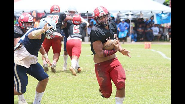 Mika Tavai (54) of the Vikings taking this reverse hand off play