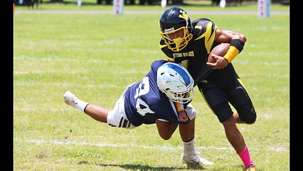  Samson Tupuola and was batted away by Sene Isileli Jr. during the opening half of their varsity match up last Saturday