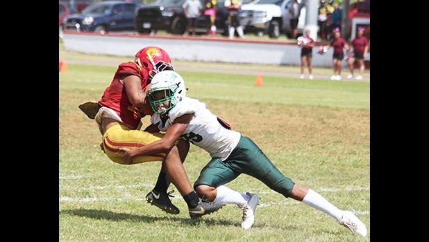 John Allen of Tafuna HS holding the ball