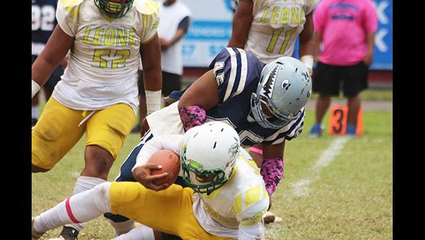 Tillus Sala (45) of the Sharks bringing down Fa’alili Fa’amoe 