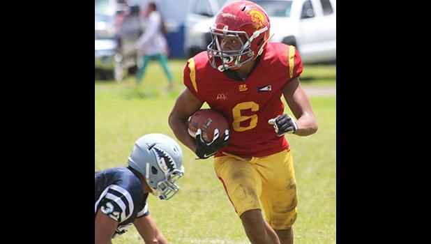 Isaiah Gurr of the Warriors with the ball at the sidelines