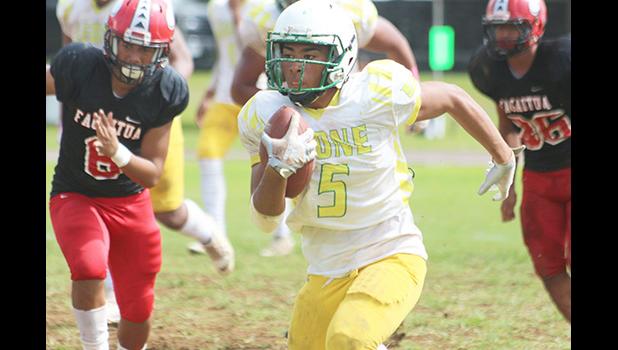 Freshman running back for the Leone Lions, Wylan Faga (5) breaking