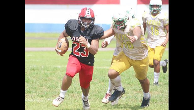 Fatu Fatu Jr. (23) of the Vikings taking this one all the way to