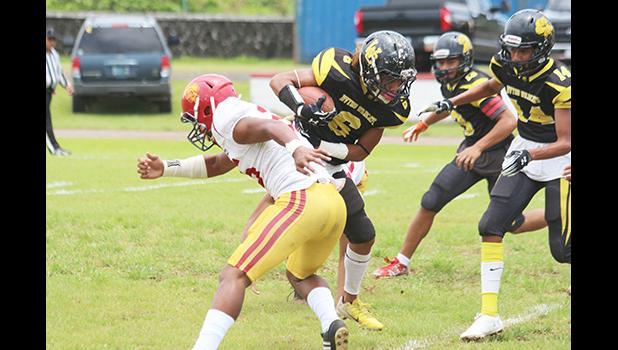 Justin Isileli (6) of the Nu’uuli Wildcats returning the opening kick-off