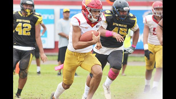 Tafuna Warriors quarterback Oakland Salave’a scrambling 