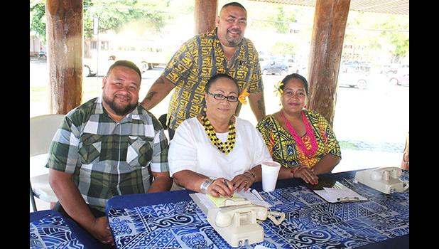 Taupau Tauleave Toluono (standing) along with ASG personnel
