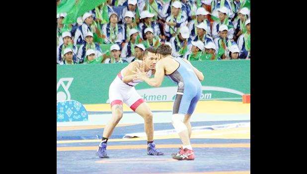 Daniel Misaalefua in his Bronze Medal Match (Photo: Terry Custodio Auva'a)