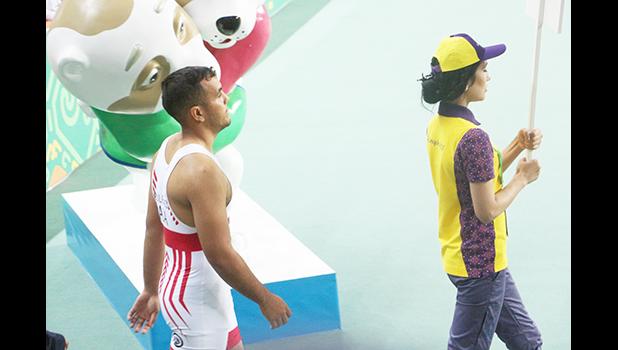 Team AS Wrestler Nolan Puletasi heading over to the mat for the bronze Medal Match in Men's Greco Roman Wrestling; 85kg (Photo: Terry Custodio Auva'a)