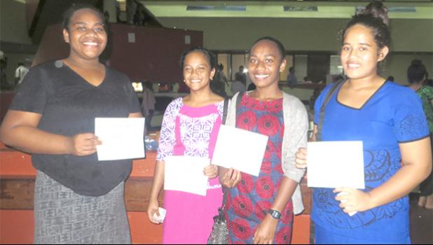 It was all smiles for these girls who received their first paycheck yesterday, for work under the Summer Youth Employment Program, administered by the Department of Human Resources. [photo: Sabrina Sinapati]