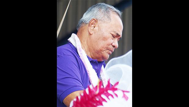 Gov. Lolo Matalasi Moliga with his eyes closed and head bowed in a silent prayer, after calling for a moment of silence to remember the victims and survivors of Hurricane Harvey, which ravaged several areas of Texas and parts of Louisiana. The governor made the call during last Friday’s annual Workforce Appreciation Day at Veterans Memorial Stadium.  [photo: Leua Aiono Frost]