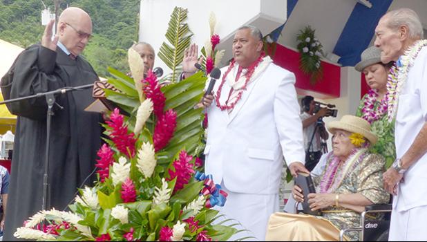 Chief Justice Lealaialoa Michael Kruse (far left) presides over the swearing in of the new governor, Lemanu Peleti Palepoi Sialega Mauga (third from left)