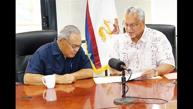 OIA Director Nikolao Pula with Governor Lolo Moliga