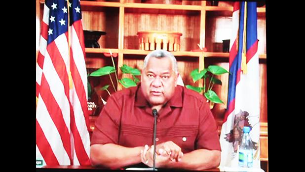 Gov. Lemanu Peleti Mauga at desk during virtual testimony
