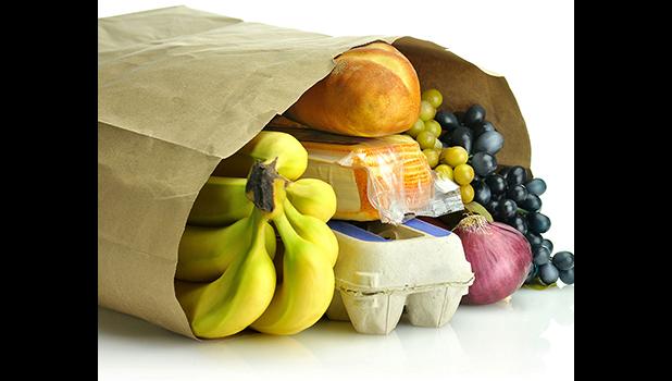 Paper bag with groceries showing