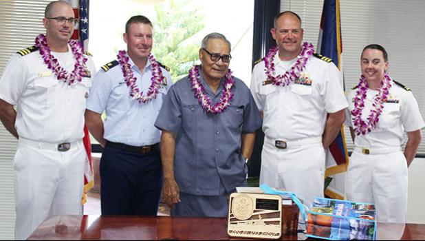 Gov. Lolo Matalasi Moliga (center) with Commander Andy Strickland, Commanding Officer of the USS Shoup; two Naval officers and a US Coast Guard official