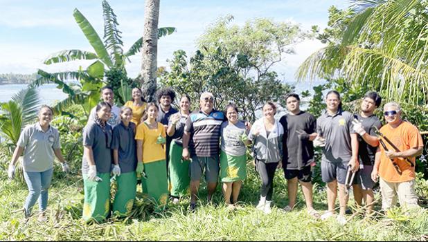Leone Pule Nu’u, Ropati Opa aka The General (front row, sixth from left) joins the Leone High School NOAA Planet Stewards in support of their efforts to remove the invasive Lusina leadtree. [courtesy photo Leone Pule Nu’u, Ropati Opa with LHS volunteers