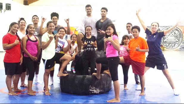 Gymnastics Australia Oceania development manager Brooke Kneebush (far right) with some of the local youngsters she worked with during a recent trip to the territory.  [photo: courtesy]