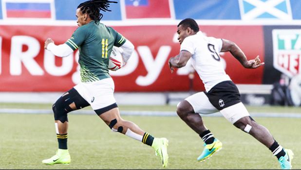Rosko Specman #11 of South Africa outruns Jerry Tuwai #9 of Fiji to score during the Cup Final match between South Africa and Fiji at the HSBC Rugby Sevens Series held in Sam Boyd Stadium March 3-5, 2017. Final score:  South Africa-19, Fiji-12. (Photo by Allan Hamilton/ Calibre Sports Photomedia)