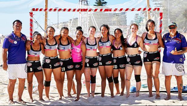 American Samoa's women’s beach handball team with their coaches