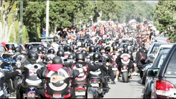 The procession of Head Hunters and other gang members