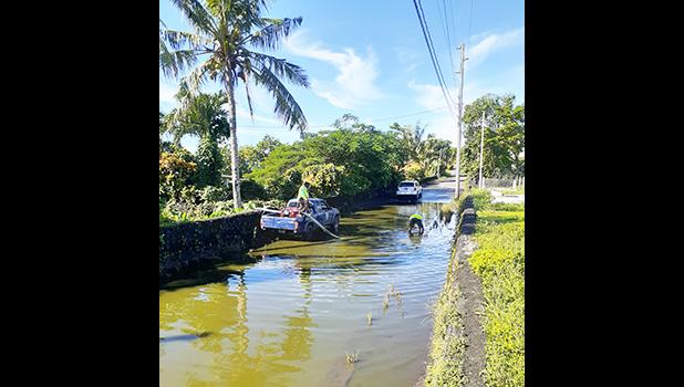 Flood water covering road near Hope House