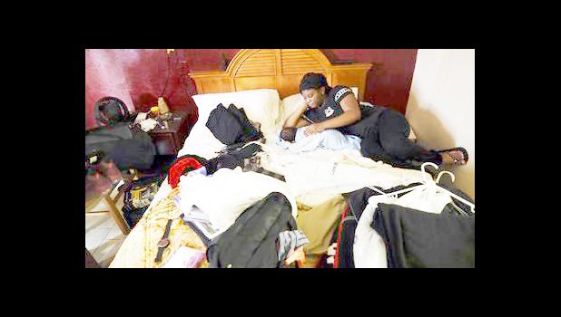 Jamica Batts sits on a hotel bed with her two-month-old baby Jarasiah Batts as they pack to leave Monday, Sept. 4, 2017, in Houston. Batts and her brother Alvin may now be forced to go from the hotel they have been staying in after Hurricane Harvey, to an area shelter. (AP Photo/Gregory Bull) Jamica Batts sits on a hotel bed with her two-month-old baby Jarasiah Batts as they pack to leave Monday, Sept. 4, 2017, in Houston. Batts and her brother Alvin may now be forced to go from the hotel they have been staying in after Hurricane Harvey, to an area shelter. (AP Photo/Gregory Bull)