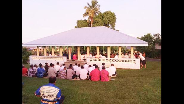 Members of the village of Falefa present a traditional Samoan ifoga 