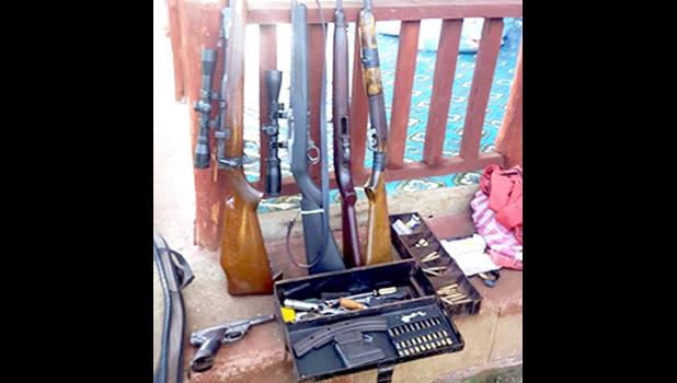 uns and bullets taken from a Police raid 
