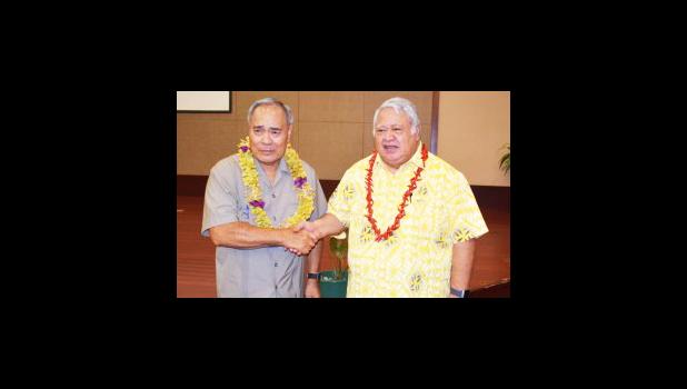 Gov. Lolo Matalasi Moliga and Tuilaepa Aiono Sailele Malielegaoi in a Samoa Observer file photo.