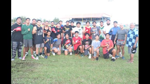 ASBA president and Coach Iakopo with boxers