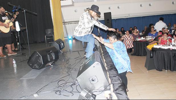 Mr. Cowboy — Sam Ah Chookoon and a fan 