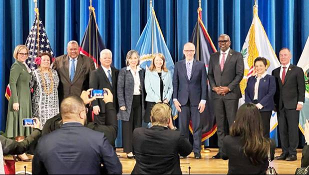 Congresswoman Uifa’atali Amata with Gov. Lemanu P.S. Mauga, Secretary of the Interior Deb Haaland, and others Amata and governor with others