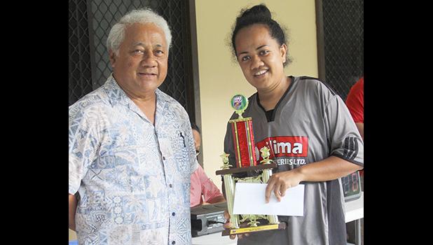 Salevu Filiva’a of Taputimu Youth receives her women’s 2018 FFAS National League MVP award from FFAS President, Sen. Faiivae Iuli Alex Godinet 