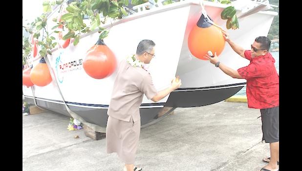 Lt. Governor La’apui christening the new DMWR vessel 
