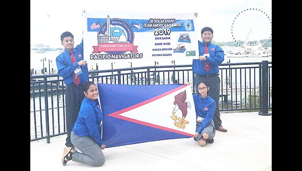 Edrik Scanlan Gaisoa, Daniel Hyuk Wang, Bianca Alenna Serrano and Petania Fou Sagaga with American Samoa flag.