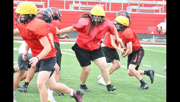 Bluffton junior Julia Mackenzie moves towards her block