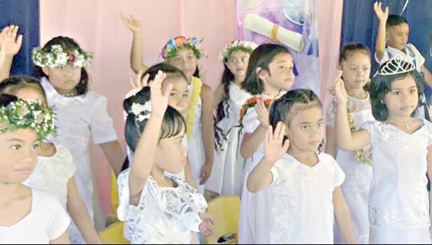 Some members of K-5 Fatuoaiga Montessori School performing at their graduation ceremony